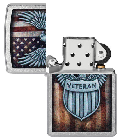 Zippo Veteran Crest Design Street Chrome Windproof Lighter with its lid open and unlit.