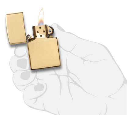 18 Kt. Gold Windproof Zippo Lighter with its lid open and lit