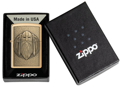 Zippo Odin Emblem Brushed Brass Windproof Lighter in its packaging.
