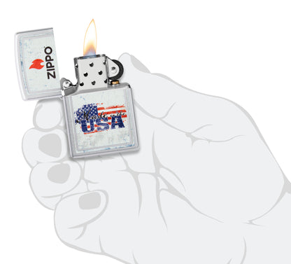 Zippo Made in the USA Design Satin Chrome Windproof Lighter lit in hand.