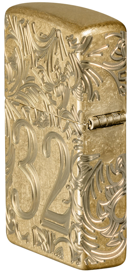 Angled shot of  Zippo 1932 Filigree Design  Armor® Tumbled Brass Windproof Lighter showing the back and hinge sides of the lighter.