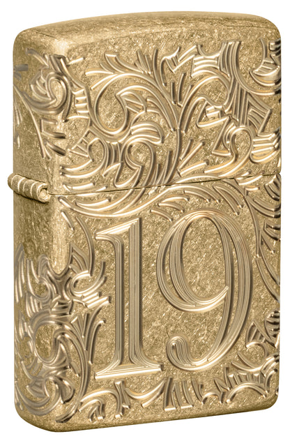 Front shot of Zippo 1932 Filigree Design  Armor® Tumbled Brass Windproof Lighter standing at a 3/4 angle.