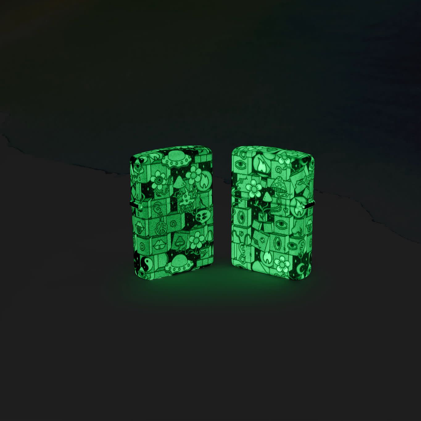 Lifestyle image of Zippo Abstract Design Glow in the Dark Green Windproof Lighter glowing in the dark.